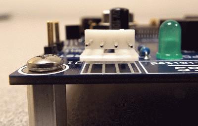 Close-up of the power jack, which is the 3-1/2" floppy disk type.