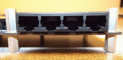 Close-up of the four-port serial output jack.  The console port is on the left end.